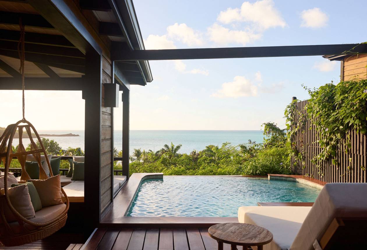 Hillside cottage plunge pool at Hermitage Bay and waterfront villa deck at Hammock Cove.